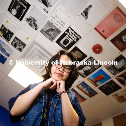 Thi Hoang Mai Vu, a CoJMC senior from Vietnam is featured for Asian and Pacific Islander Desi American Heritage Month. She is posing in one of the College of Journalism and Mass Communications' sponsored break-out rooms in the Experience Lab in Anderson Hall. May 10, 2023. Photo by Craig Chandler / University Communication.